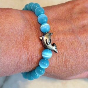 KC blue tiger eye beads and faux silver porous charm bracelet.